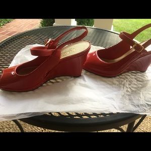 Red patent wedge shoes.  CHAPS